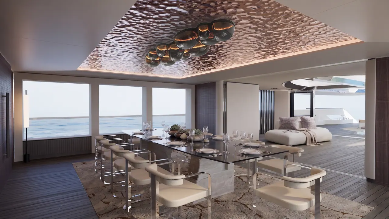 Velado dining room beneath a sculpted metallic ceiling