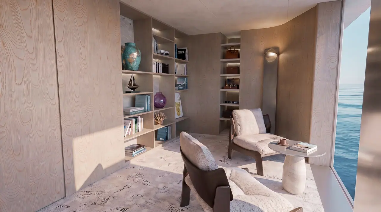 Velado owner’s study with bookshelves and lounge chairs